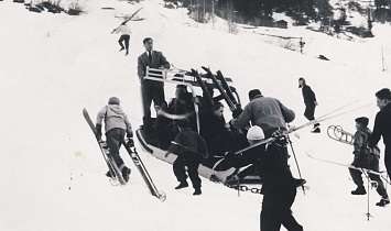 Skiers heading up to the start of the ski race together