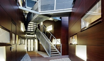 Each and every detail well thought out - staircase with access to the lift and to the individual apartments