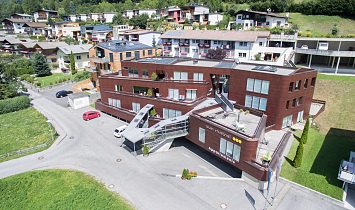 SUN Matrei and the holiday apartments arranged in terraces in the foreground